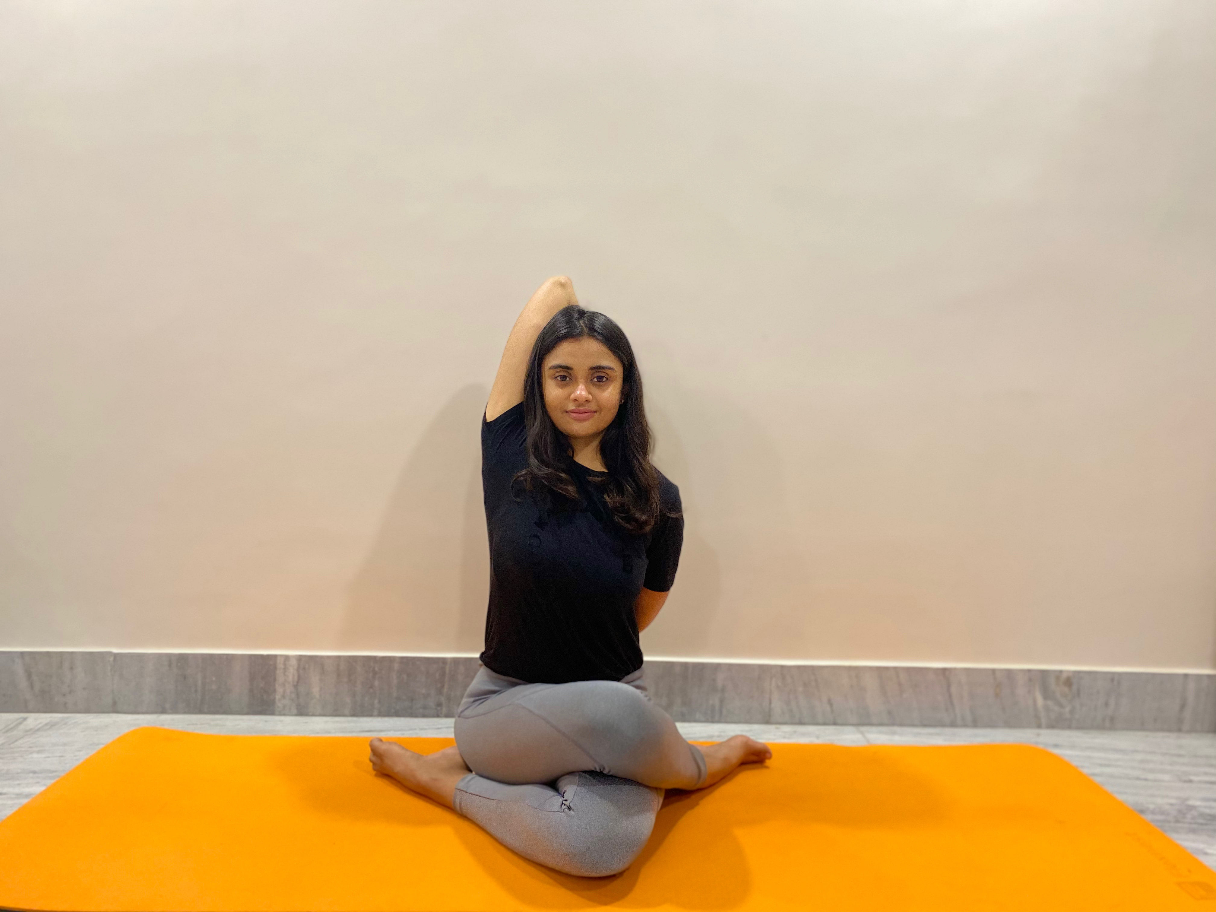 Cow face pose (Gomukhasana) Yoga Pose for PMS