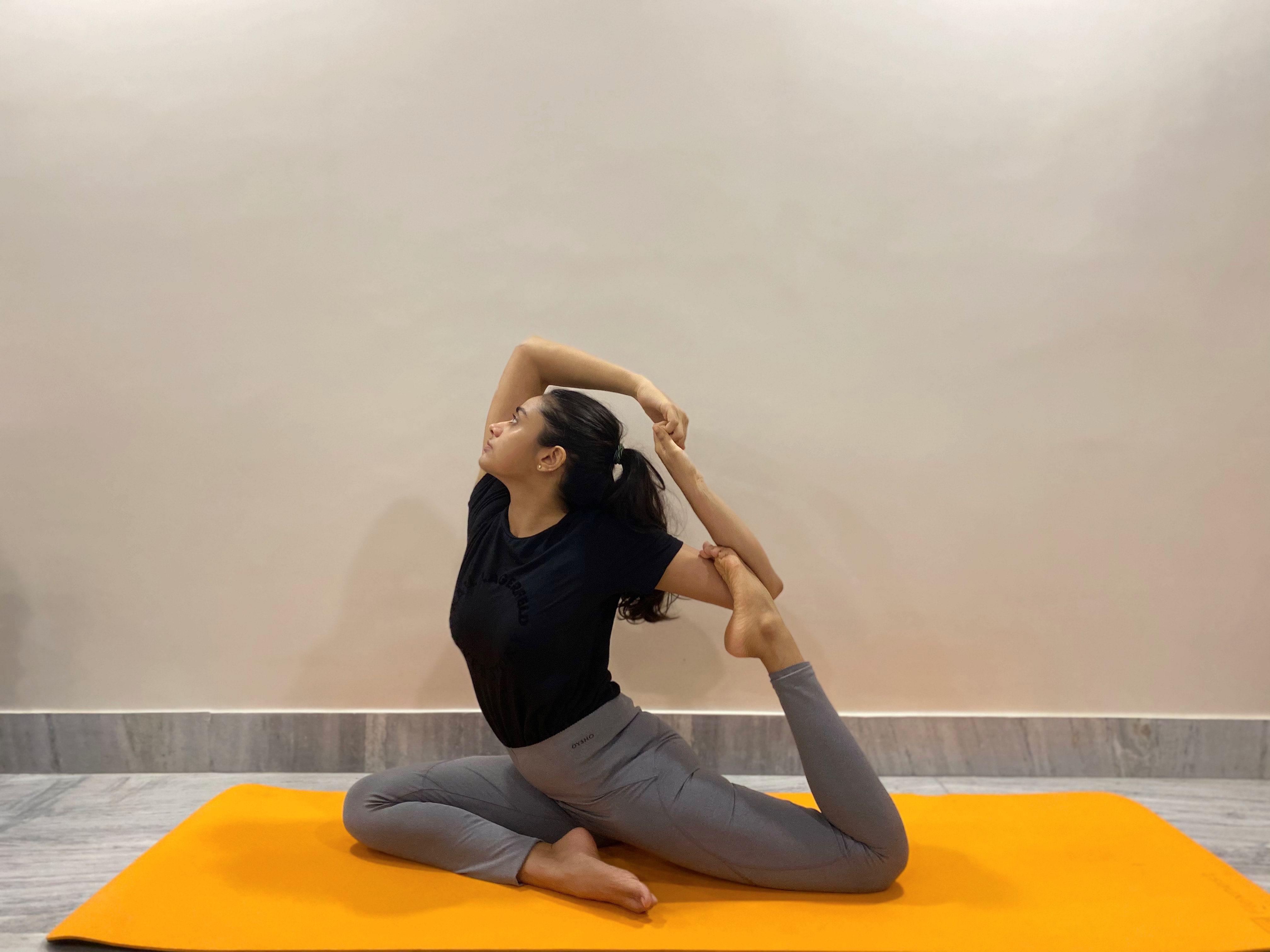 Eka Pada Rajakapotasana (One-legged king pigeon pose) Yoga Pose for PMS