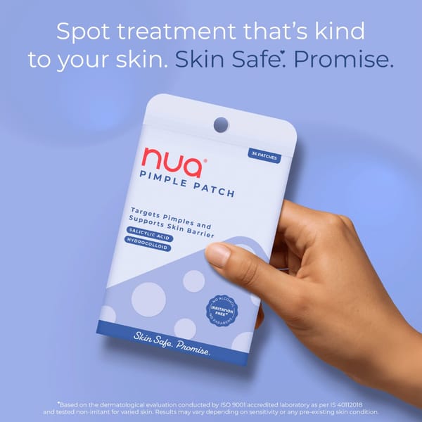 Woman holding Nua pimple patch product pack designed for covering pimples and supporting acne care